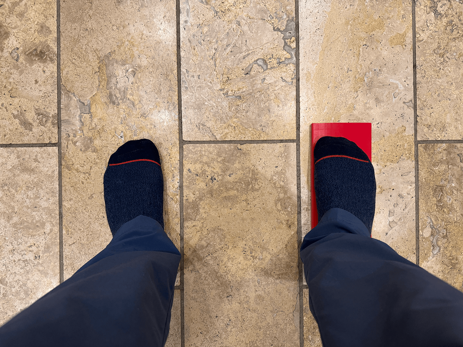 Top-down shot of feet on SlopeFeel wedge